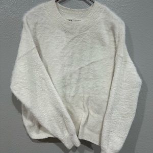 White fuzzy sweater